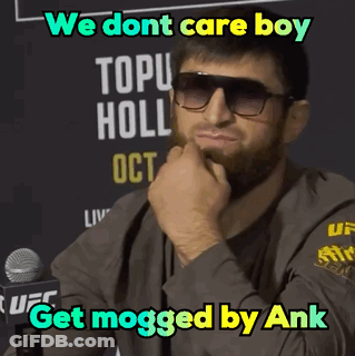 A Man Wearing Sunglasses Is Sitting In Front Of A Microphone And Says We Dont Care Boy Get Mogged By Ank GIF