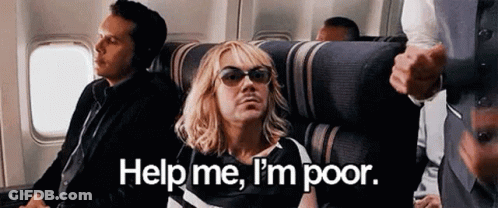 A Man Wearing Sunglasses Is Sitting On A Plane And Asking For Help . GIF