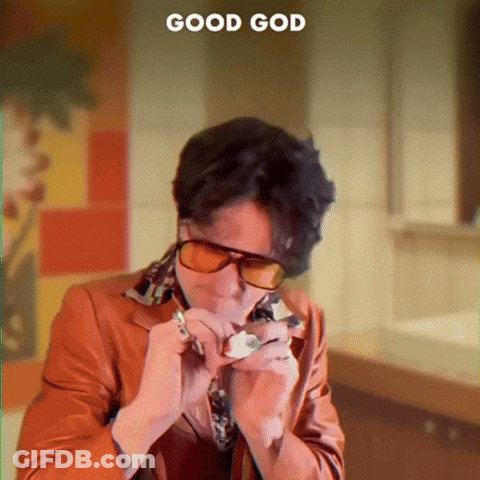A Man Wearing Sunglasses Is Smoking A Cigarette With The Words Good God Behind Him GIF