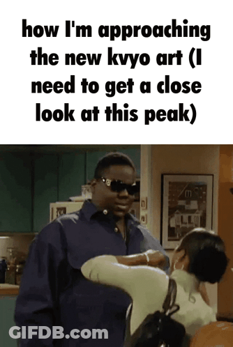 Sunglasses Man Talking To Woman In Kitchen About New Kvyo Art GIF