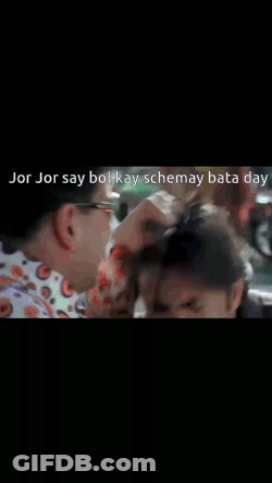 A Man Wearing Sunglasses Is Talking To Another Man GIF
