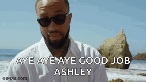 A Man Wearing Sunglasses Says Aye Aye Aye Good Job Ashley On The Beach GIF