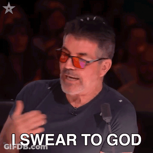A Man Wearing Sunglasses Says " I Swear To God " In Front Of A Microphone GIF