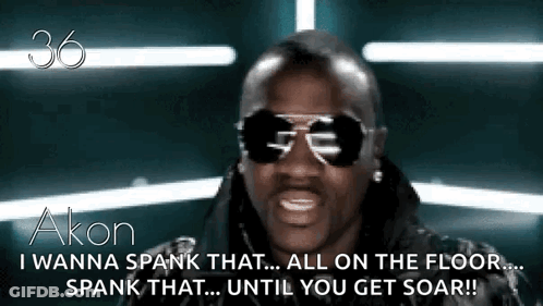 A Man Wearing Sunglasses Says " I Wanna Spank That All On The Floor Spank That ... Until You Get Soar !! " GIF