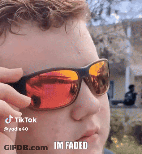A Man Wearing Sunglasses Says Im Faded In A Tiktok Video GIF