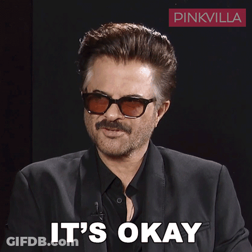 A Man Wearing Sunglasses Says It 'S Okay In White Letters GIF