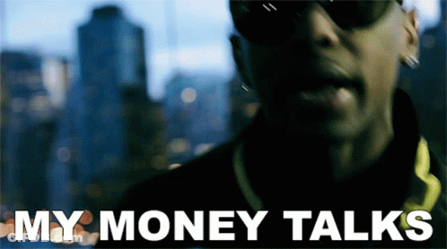 A Man Wearing Sunglasses Says " My Money Talks " In Front Of A Blurry Background GIF