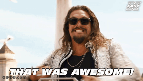 A Man Wearing Sunglasses Says That Was Awesome On The Screen GIF