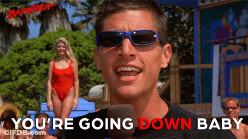 A Man Wearing Sunglasses Says " You 'Re Going Down Baby " In Front Of A Microphone GIF