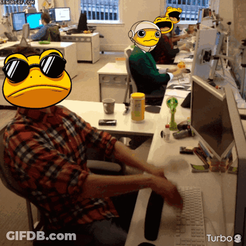 A Man Wearing Sunglasses Sits At A Desk With A Turbo Logo On The Bottom Right GIF