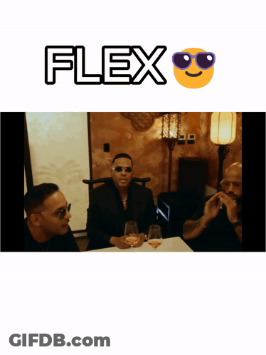 A Man Wearing Sunglasses Sits At A Table With Two Other Men With The Word Flex Above Him GIF