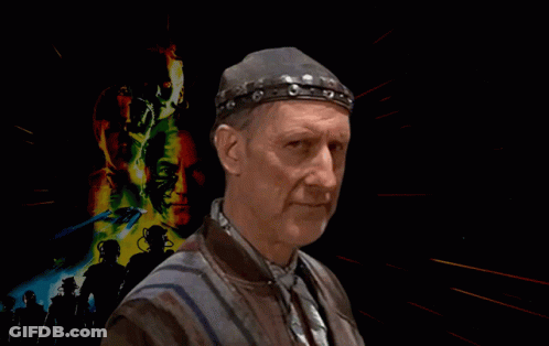 A Man Wearing Sunglasses With The Words Happy First Contact Day Behind Him GIF