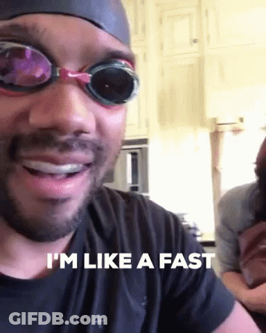 A Man Wearing Swim Goggles And A Swim Cap Says I 'M Like A Fast GIF