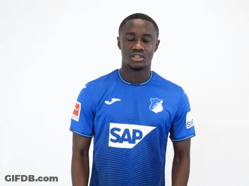 A Man Wears A Blue Shirt With The Word Sap On It GIF