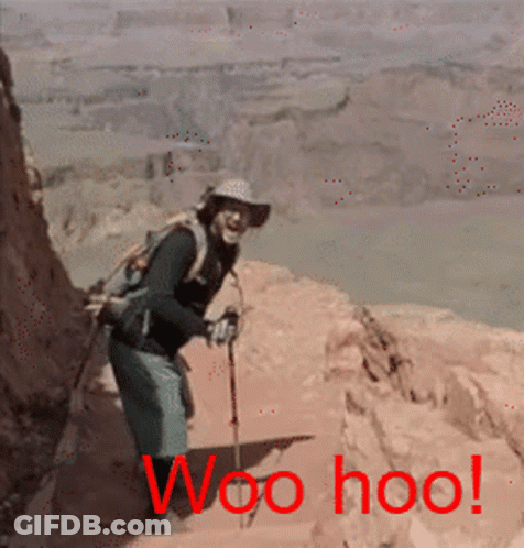A Man With A Backpack And Hiking Poles Is Standing On A Rocky Cliff With The Words Woo Hoo Written In Red GIF
