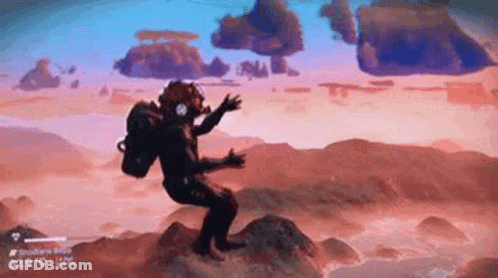 A Man With A Backpack Is Standing On Top Of A Rock In A Video Game . GIF