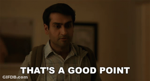 A Man With A Backpack Says That 'S A Good Point In A Dark Room GIF
