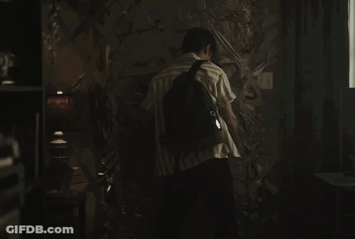 A Man With A Backpack Stands In A Dark Room With The Words If You 'Re Having Trouble With The Door Below Him GIF