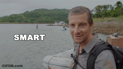 A Man With A Backpack Stands In Front Of A Body Of Water With The Word Smart Below Him GIF