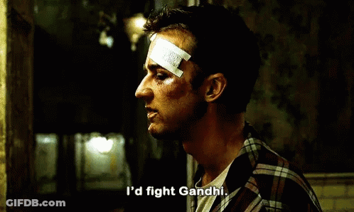 A Man With A Bandage On His Forehead Says I 'D Fight Gandhi . GIF