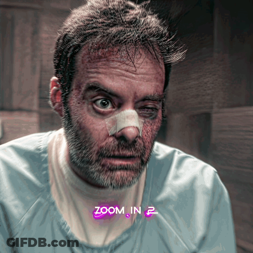 A Man With A Bandage On His Nose Has Zoom In 2 Written On The Bottom GIF