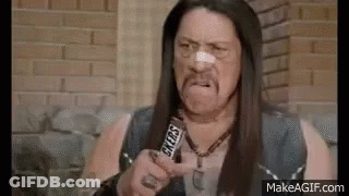 A Man With A Bandage On His Nose Is Holding A Snickers Bar In His Hand . GIF