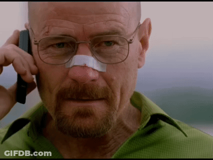A Man With A Bandage On His Nose Is Talking On A Cell Phone GIF