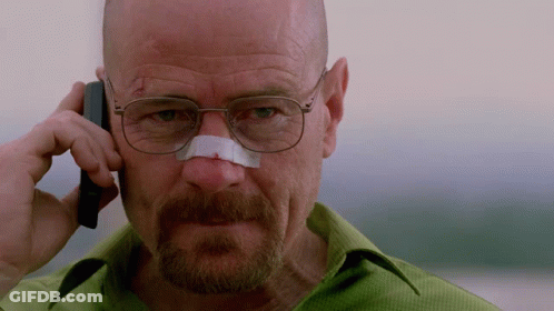 A Man With A Bandage On His Nose Talking On A Cell Phone GIF