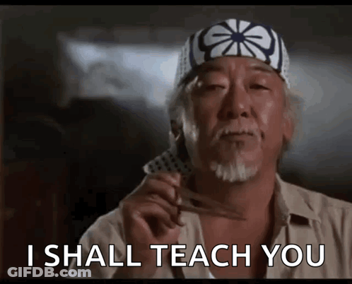 A Man With A Bandana On His Head Is Holding A Pair Of Scissors And Says I Shall Teach You GIF