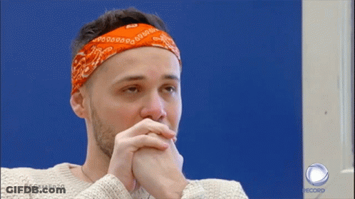 A Man With A Bandana On His Head Is On A Record Show GIF