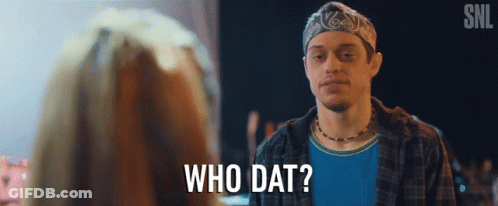 A Man With A Bandana On His Head Is Talking To A Woman And Says Who Dat GIF