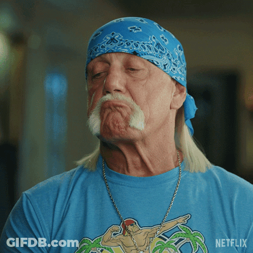 A Man With A Bandana On His Head Is Wearing A Netflix T-Shirt GIF