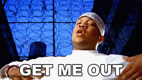 A Man With A Bandana On His Head Says " Get Me Out " GIF