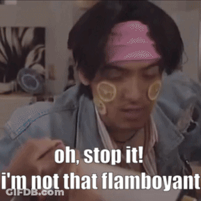 A Man With A Bandana On His Head Says " Oh Stop It I 'M Not That Flamboyant " GIF