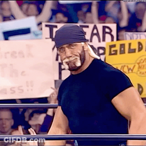 A Man With A Bandana On His Head Stands In Front Of A Sign That Says I Fear Gild GIF