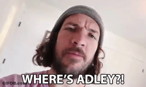 A Man With A Beard And A Beanie Is Looking At The Camera And Says `` Where 'S Adley '' . GIF