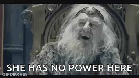 A Man With A Beard And A Crown Is Sitting On A Throne And Says `` She Has No Power Here '' . GIF