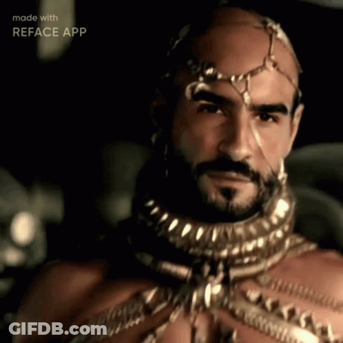 A Man With A Beard And A Crown On His Head Is Being Made With Reface App GIF