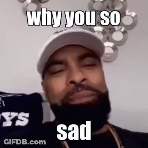 A Man With A Beard And A Hat Is Making A Sad Face And Says `` Why You So Sad '' . GIF