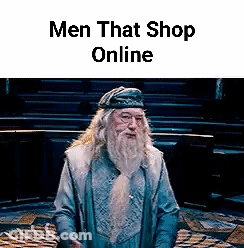 A Man With A Beard And A Hat Is Standing In A Room With The Words `` Men That Shop Online '' Above Him . GIF