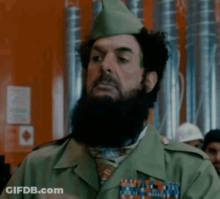 Man With Beard And Hat In Green Uniform GIF