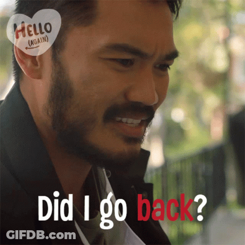 A Man With A Beard And A Heart That Says Hello Again GIF