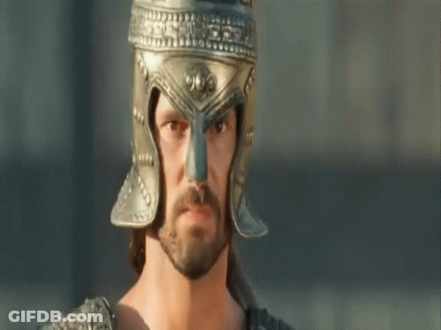 A Man With A Beard And A Helmet On His Head GIF
