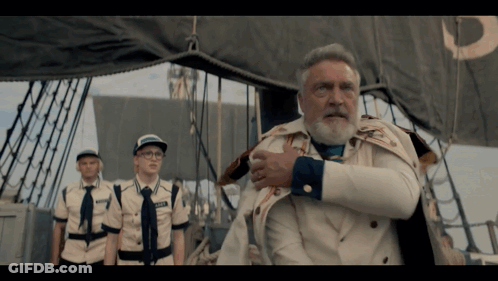 A Man With A Beard And A Name Tag That Says " Captain " On It GIF