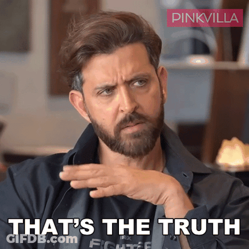 A Man With A Beard And A Pinkvilla Logo Behind Him GIF