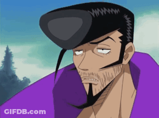 A Man With A Beard And A Purple Shirt Has A Black Hat On GIF