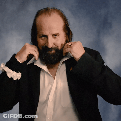 A Man With A Beard And A Ring On His Finger GIF