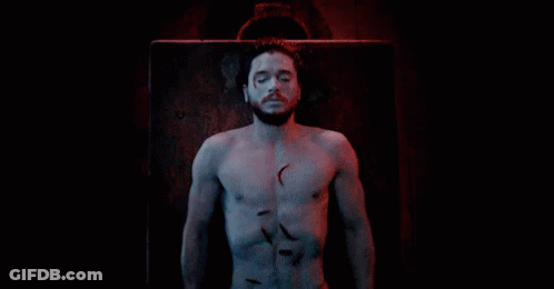 A Man With A Beard And A Scar On His Face Says I 'M Alive GIF