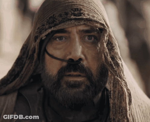 A Man With A Beard And A Scarf Around His Head Has A Hose Coming Out Of His Nose GIF