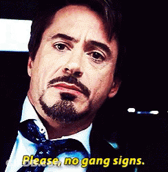 A Man With A Beard And A Tie Says Please No Gang Signs GIF
